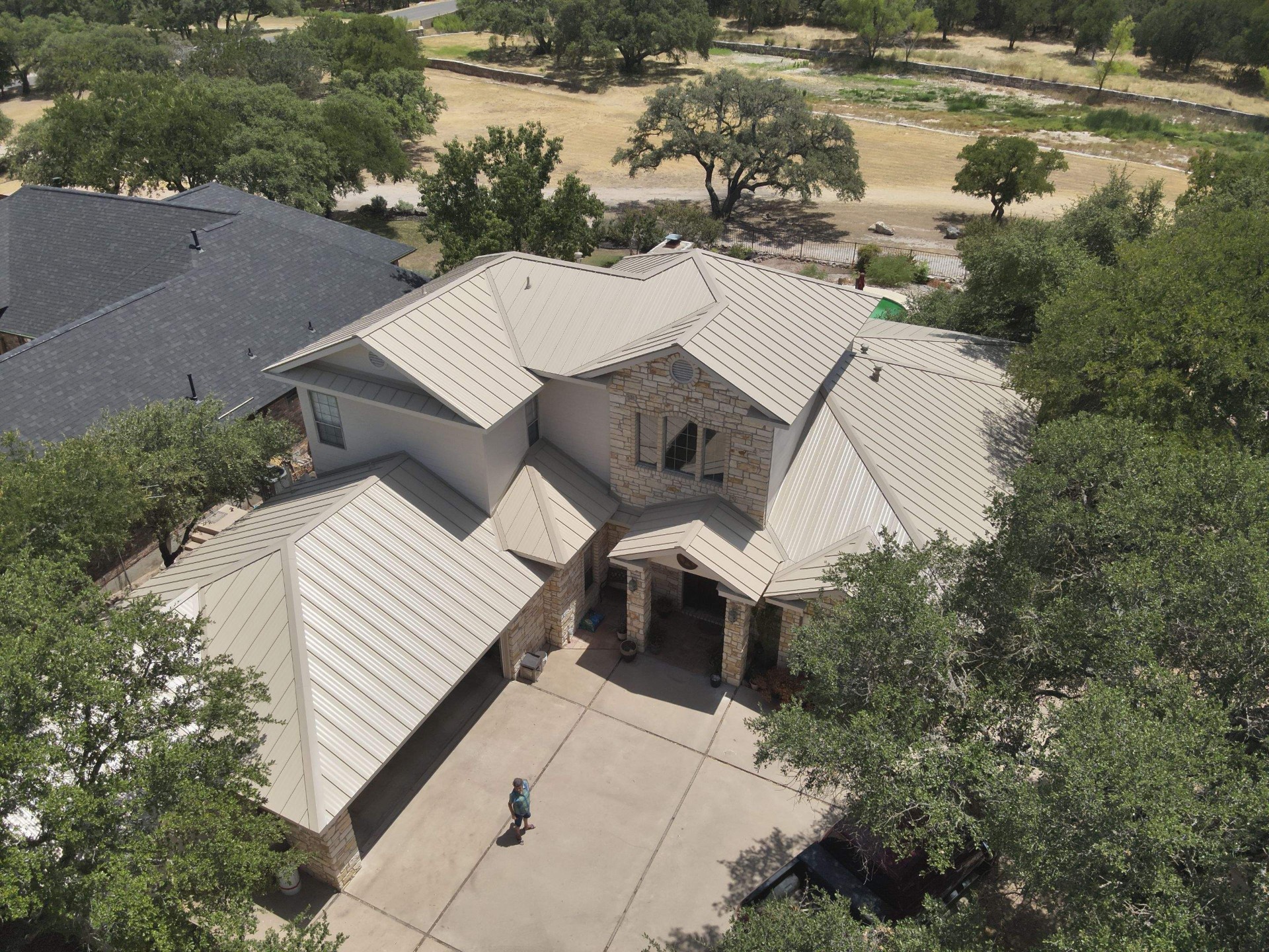 Residential Roof Replacement using 24 GA Standing Seam