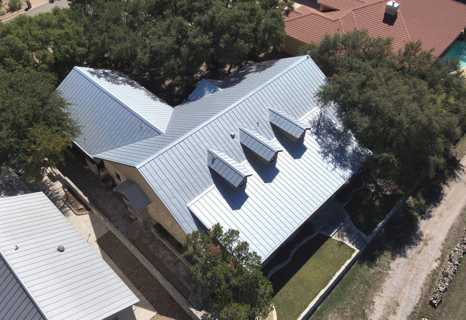 Standing seam metal roof with dormers