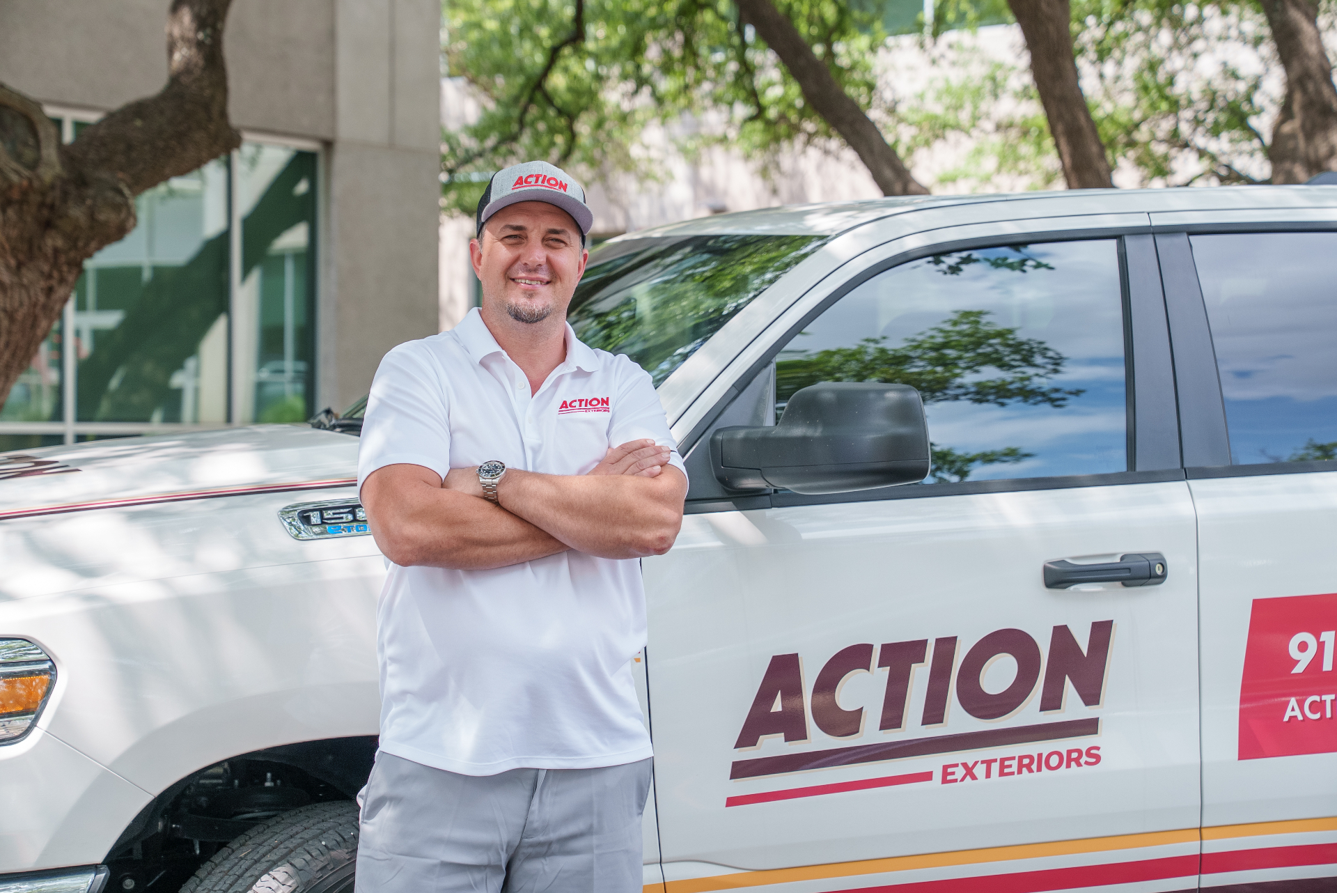 Action Exteriors Austin owner with company truck