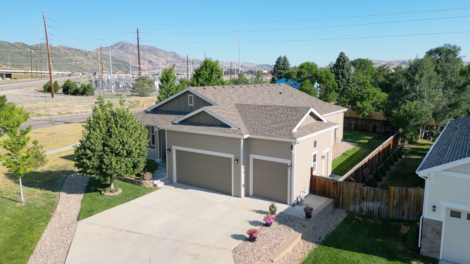 Beautiful home showcasing roofing, siding, windows, and gutter services - Action Exteriors