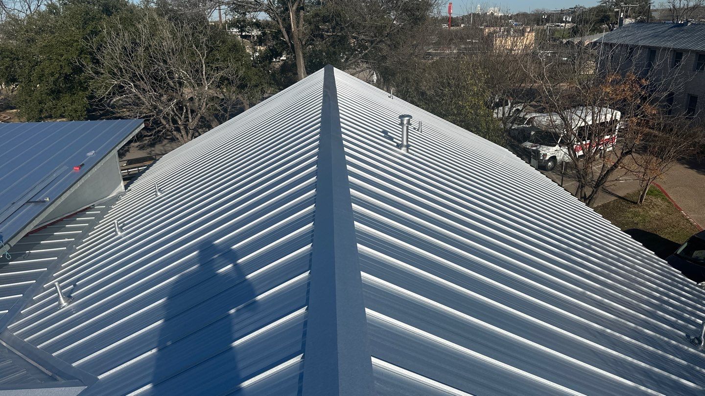 Standing seam metal roof ridge detail