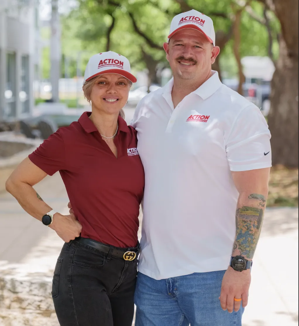 Franchise couple in Action Exteriors uniforms