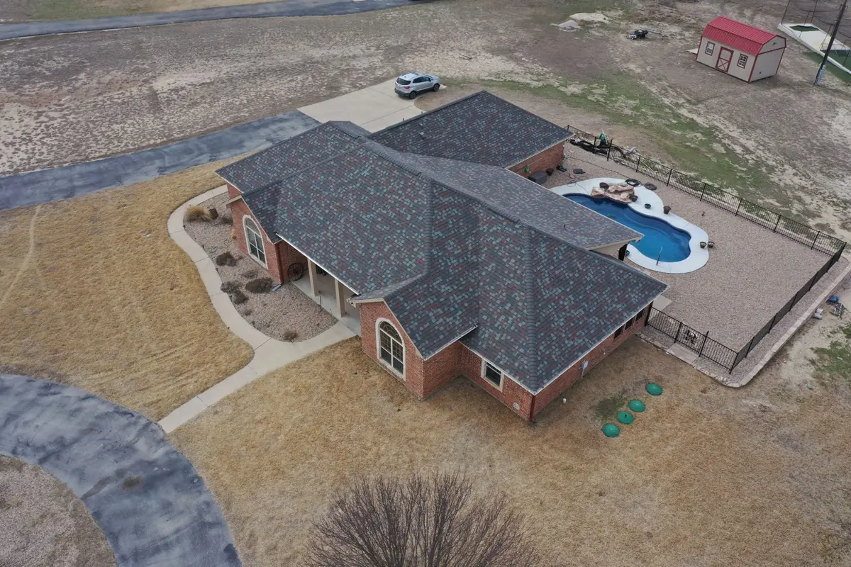 Aerial view of Tulsa neighborhood served by Action Exteriors roofing and exterior services
