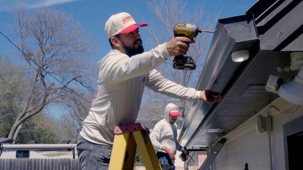 Action Exteriors Austin working on a home for residential roof replacement.
