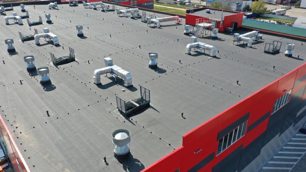 A flat roof that was commercially replaced by Action Exteriors Austin