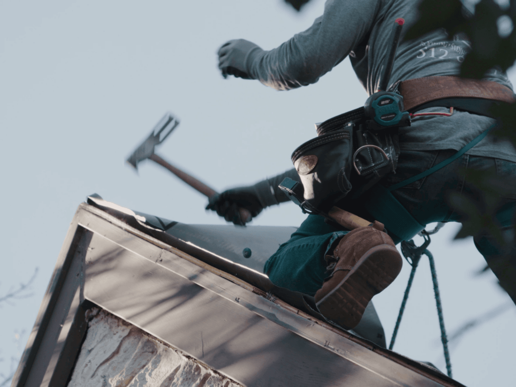 Action Exterior roofers working