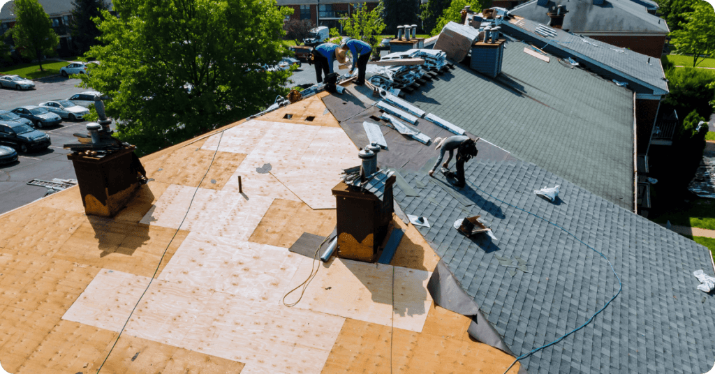 action exteriors roofer putting in a quality roofer