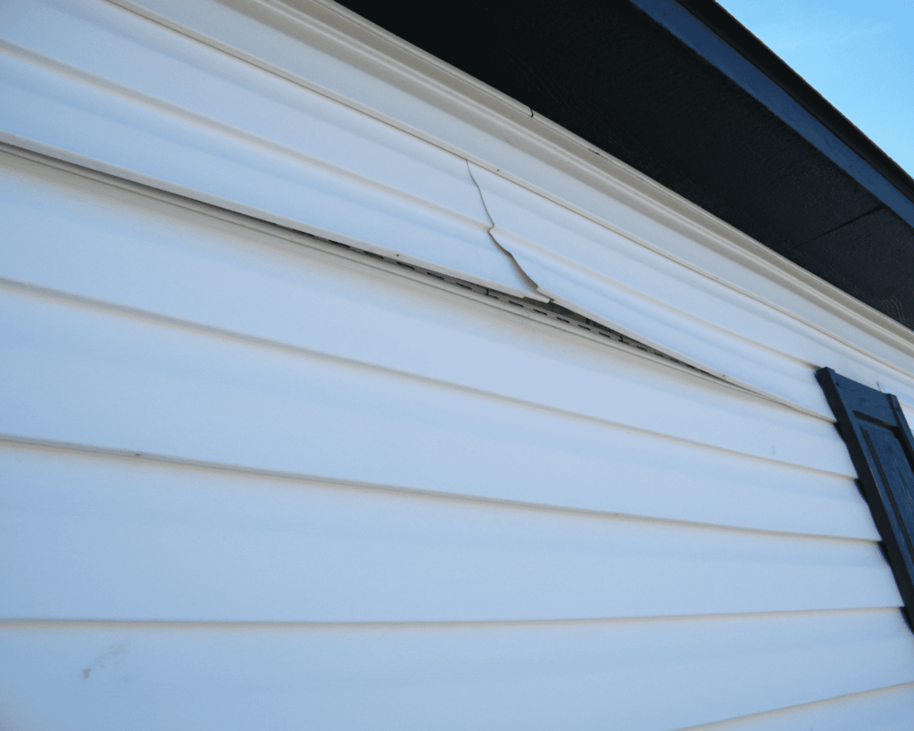 Cracked siding. Does not need painting, it needs replacing.