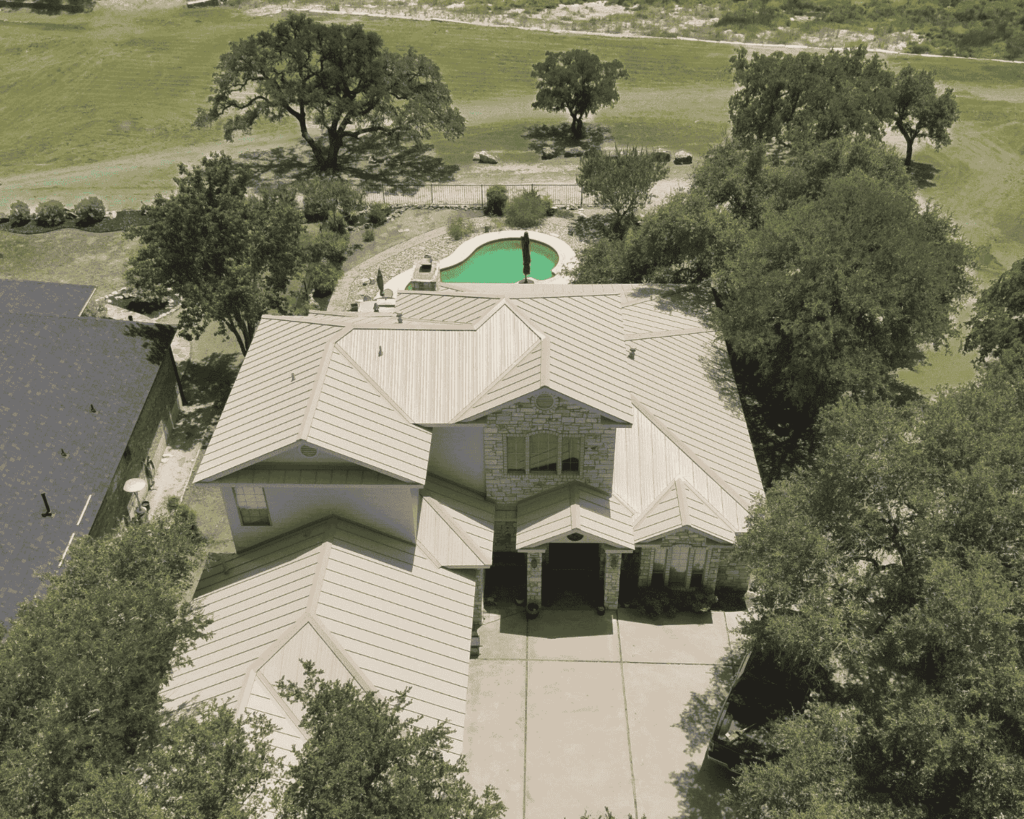 a home with a metal silver roof which was a recently completed roof repair job_action exteriors