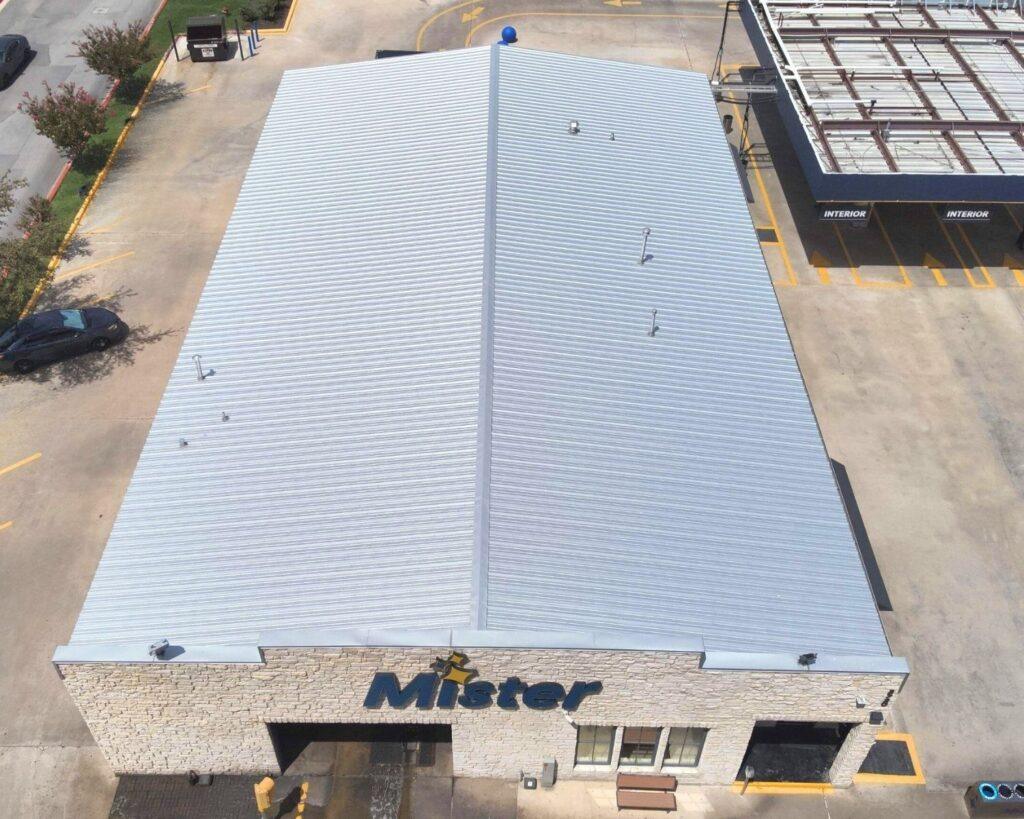 a commercial roof for a car company installed by action exteriors